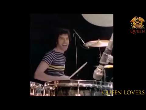 Freddie Mercury playing drums ~ Roger Taylor playing guitar